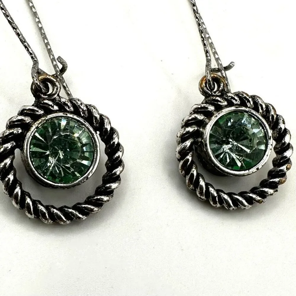 Silver tone green crystal dangling earrings